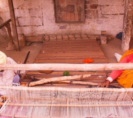Man and Woman weaving carpet at Bishnoi Village