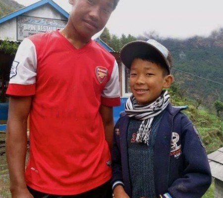 Two local Nepali boys posing for the photo